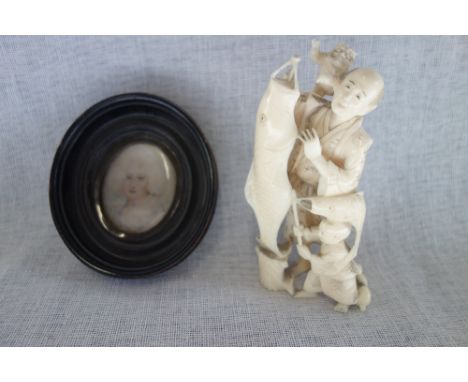 A GEORGE III PORTRAIT MINIATURE, AND A 19TH CENTURY CHINESE IVORY CARVING OF A FISHERMAN