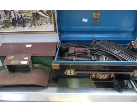 A COLLECTION OF HORNBY O GAUGE RAILWAY TRACK, a clockwork locomotive (damaged) and railway buildings contained in a vintage t