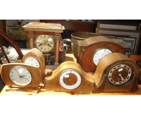 AN EARLY 20TH CENTURY MAHOGANY CASED MANTEL CLOCK by Walker and Hall with a French movement and five other mantel clocks