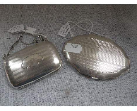 A SILVER LADIES PURSE, with fitted interior, and a metalware compact (c.1.7oz) (2)