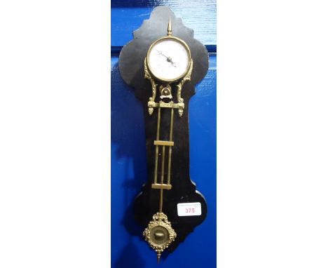 A BRASS CASED MYSTERY CLOCK on an ebonised bracket