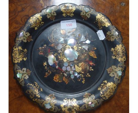 A VICTORIAN PAPIER MACHE PLATE with mother-of-pearl gilt and painted decoration, 27cm diam
