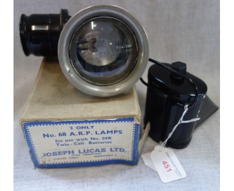 A JOSEPH LUCAS LTD No 68 A.R.P. LAMP (in original box) and a carbide bicycle lamp
