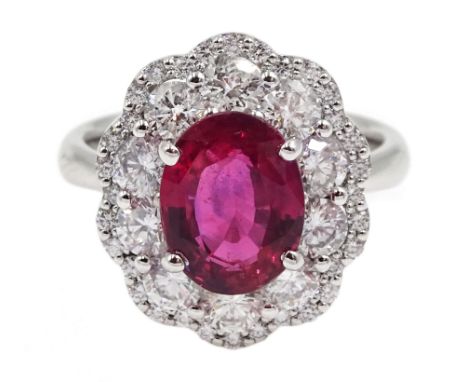 18ct white gold unheated oval ruby and round brilliant cut diamond cluster ring, hallmarked, ruby 3.07 carat, total diamond w