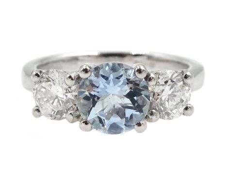 Platinum three stone round aquamarine and round brilliant cut ring, hallmarked, aquamarine approx 1.00 carat, total diamond w