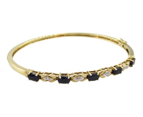 9ct gold diamond and oval sapphire hinged bangle, hallmarkedClick here to view further images, condition reports, sale times 