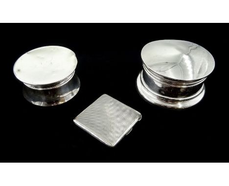 Silver circular jewellery box and larger box possibly for shaving both by A &amp; J Zimmerman, 1912 and 1915 and a silver eng