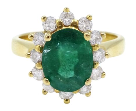 Gold oval emerald and diamond cluster ring, stamped 18K, emerald approx 1.60 caratClick here to view further images, conditio