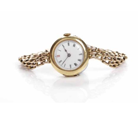 LADY'S EARLY TWENTIETH CENTURY EIGHTEEN CARAT GOLD COCKTAIL WATCH
unsigned manual wind movement, the white dial with Arabic n