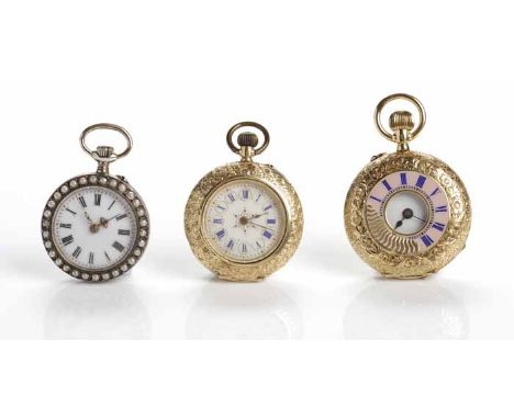 THREE LADY'S VICTORIAN FOB WATCHES
comprising of an eighteen carat gold half hunter example, an eighteen carat gold open face