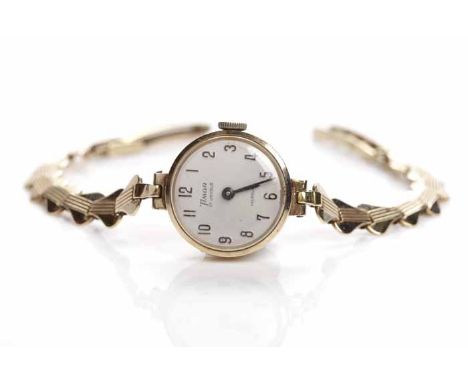 LADY'S MID-TWENTIETH CENTURY NINE CARAT GOLD TIMOR COCKTAIL WATCH
signed seventeen jewels manual wind movement, the silvered 