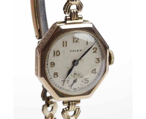 LADY'S EARLY TWENTIETH CENTURY NINE CARAT GOLD ROLEX PRIMA COCKTAIL WATCH
signed fifteen jewels Rolex manual wind movement, t