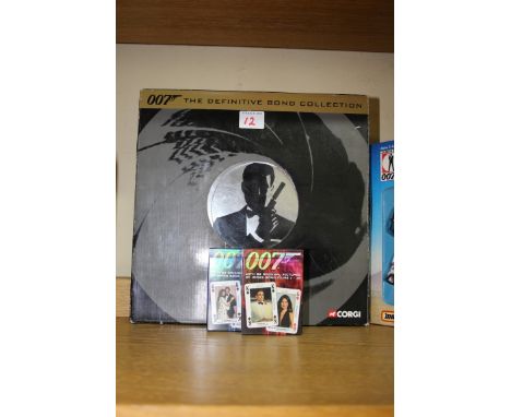 A Corgi 'The Definitive Bond' film canister 4 piece set, No.CC99106, boxed; together with two packs of '007' playing cards. 