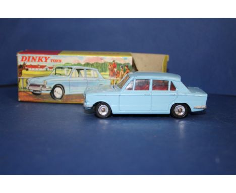 A Dinky Toys light blue Triumph 1300, No.162, boxed. 