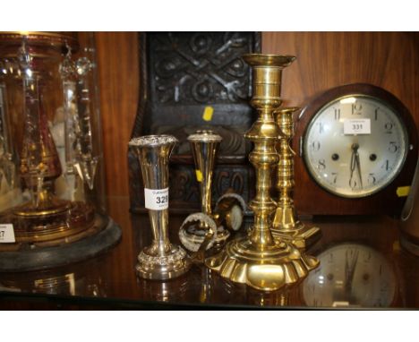 A GEORGIAN BRASS CANDLESTICK TOGETHER WITH ANOTHER, NAPKIN RINGS ETC. (9)