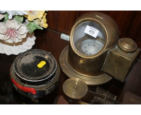 A VINTAGE NAVAL MILITARY COMPASS TOGETHER WITH A BRASS EXAMPLE (2) 
