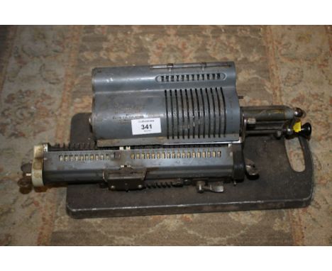 A VINTAGE BRITANNIC CALCULATING MACHINE