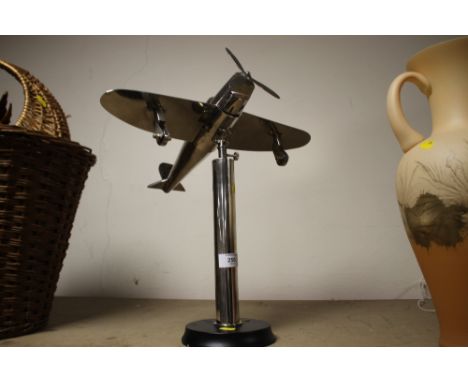 A MODERN CHROME EFFECT VINTAGE PLANE MODEL