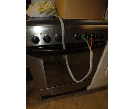 AN INDESIT OVEN WITH CERAMIC HOB A/F