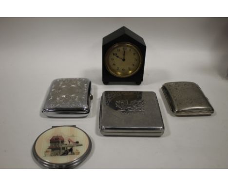 AN EBONISED H.A.C. DESK CLOCK TOGETHER WITH THREE CIGARETTE CASES AND A COMPACT (5)