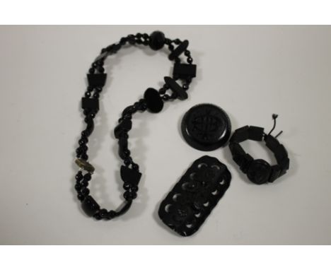 A BAG OF VINTAGE JET STYLE JEWELLERY 