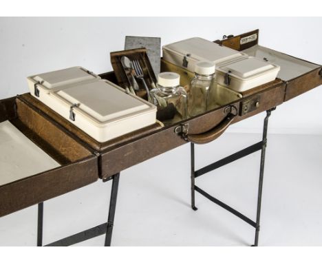 Motoring Picnic Case, a vintage 1930/40's Sirram folding fitted table picnic case, in brown, with metal fold out legs and ivo