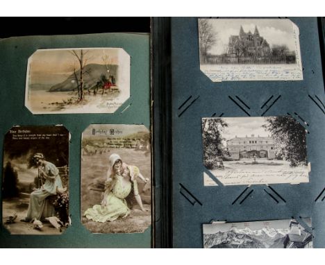 Postcards albums, a collection of approx 550 cards mostly from the early 1900's in two vintage albums and one modern album an