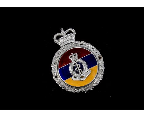 Motoring, a vintage 1960, Army Medical Corps, car badge. In red, yellow and blue enamel with a chrome central mounted corps b