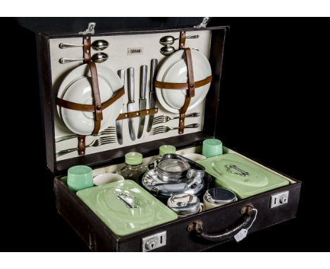 Motoring Picnic case, a vintage Sirram  1930/40's picnic case in dark brown, with four place setting including knifes, forks,