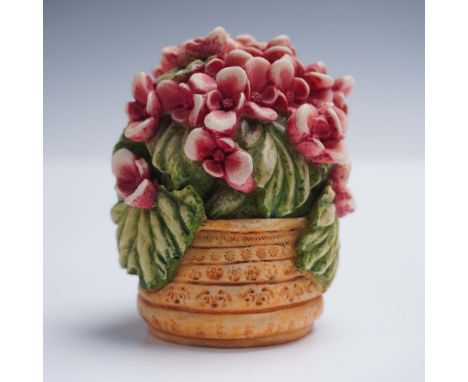Crafted from a blend of crushed marble and resin, this handcrafted piece from the Harmony Garden series by Harmony Kingdom fe