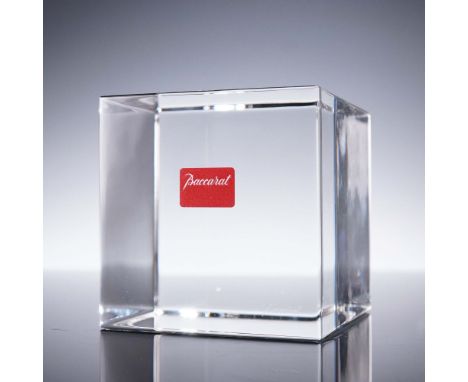 This Baccarat clear crystal cube is a pristine geometric form, showcasing the purity and brilliance of fine Baccarat craftsma
