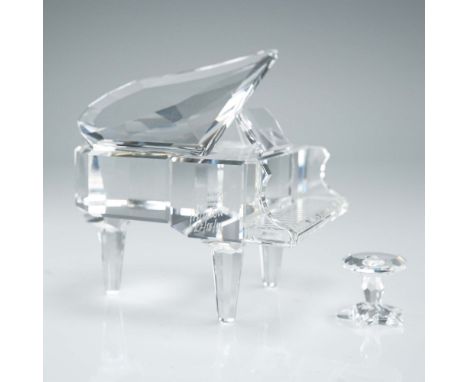 This Swarovski Silver Crystal grand piano figurine features a stunningly faceted clear crystal construction complete with a c