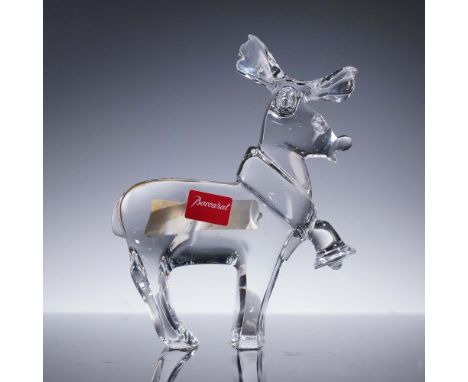 Festive Baccarat crystal figurine of a reindeer, elegantly crafted in clear crystal with stylized antlers and a raised scarf 
