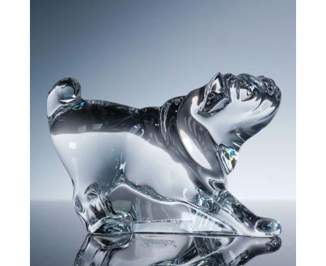 Baccarat crystal figurine depicting a playful bulldog in a dynamic stretching pose, rendered with elegant curves and striking