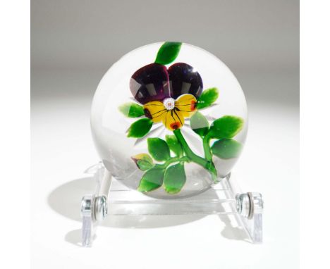 This exquisite Baccarat crystal paperweight features a beautifully detailed pansy blossom in rich yellow and deep plum purple