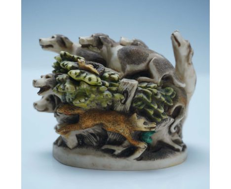 This Harmony Kingdom jewelry box titled Tally Ho features a dynamic hunting scene with a lively pack of hounds racing through