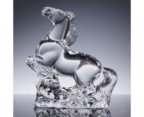 This Baccarat crystal figurine features the 2014 Zodiac Horse in a dynamic rearing pose, symbolizing strength, elegance, and 