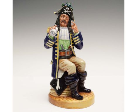 This Royal Doulton figurine titled Pirate King, model HN2901, presents a richly detailed and characterful pirate captain seat