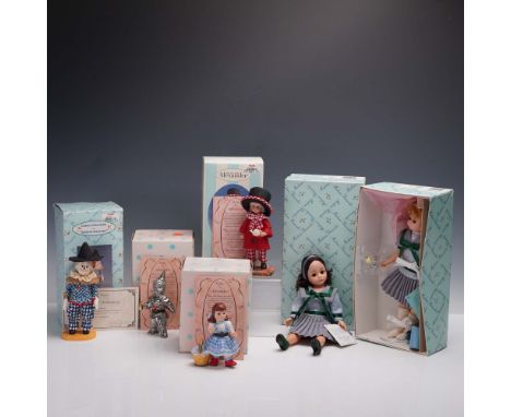 This delightful 6 piece lot features Madame Alexanders beloved characters. Included are two charming porcelain boxes depictin