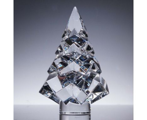 Striking Baccarat crystal figurine in the form of a stylized holiday tree, featuring a geometric faceted design that catches 