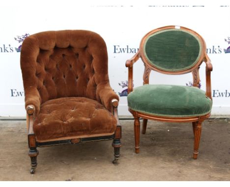 Victorian gentleman's button back armchair, with scroll and floral carved arms, above cabriole legs and pot castors, an eboni