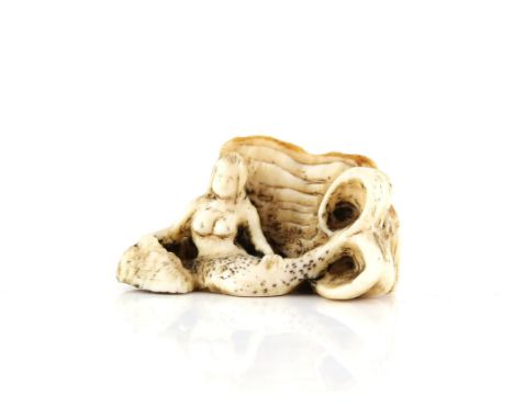 A Japanese Netsuke , Meiji PeriodCarved Ivory in shape of a mermaid , 2 X 4 cmComes with a Dutch certificate of authenticity 