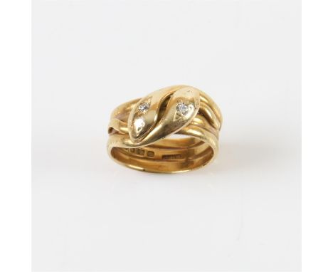 20th C Double headed snake ring, with two old mine cut diamonds, in 18 ct yellow gold, hallmarked London 1938, size R 1/2.Con