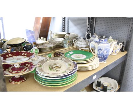 Collection of Victorian teapots, covered sugar bowls, plates and cake stands, including a blue and yellow teapot hand-painted