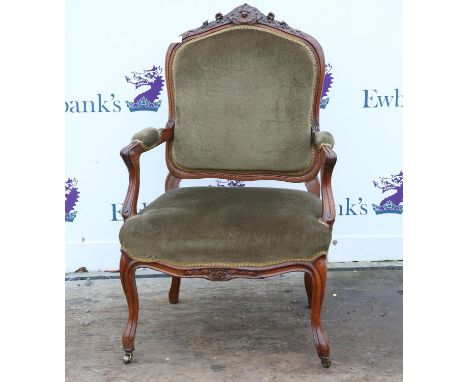Mahogany open armchair, with floral carved top rail, on cabriole legs, together with a nursing chair with button back upholst