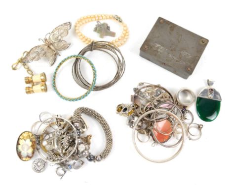 Mixed collection of costume jewellery, including silver bangles, rings and pendants, shell cameo brooch, faux pearl necklace,