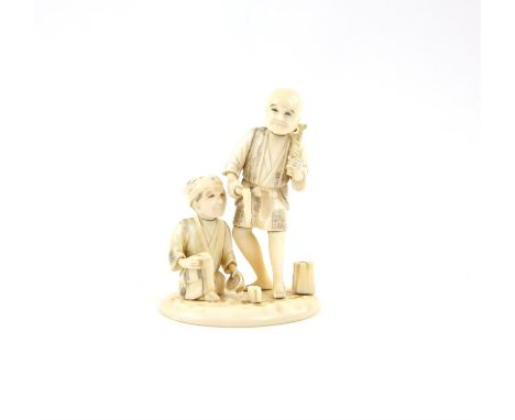 A Japanese Okimono , Meiji Period Carved Ivorydepicting two people ..9.8 X 7.9cm. Comes with a Dutch certificate of authentic