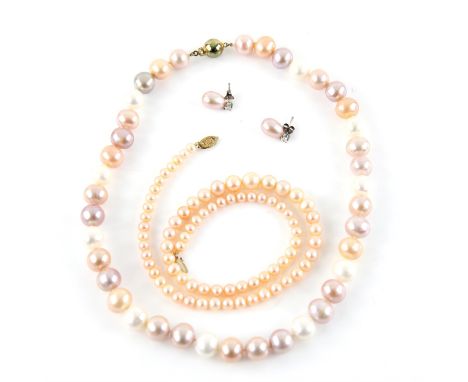 Two pearl strands and pearl earrings, peach, white and pink cultured pearl strand, with a gold plated silver clasp,strung wit