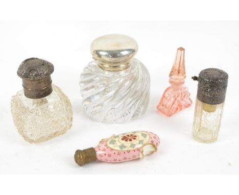 Silver topped glass inkwell, London 1888, silver topped perfume atomiser, another atomiser and two scent bottlesCondition Rep
