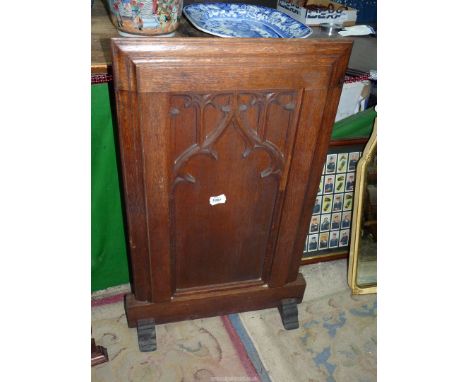 An Oak Gothic style Firescreen, 19 1/2" x 34" approx. 